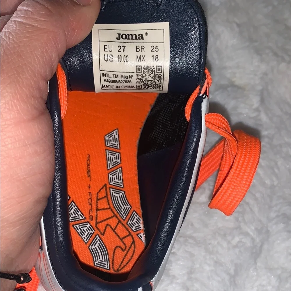 Kids Black and Orange Soccer Shoes like new